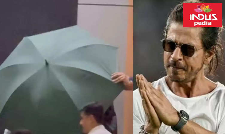Shah Rukh Khan hiding behind umbrella after being discharged from hospital in Ahmedabad